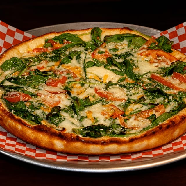 Spinach, Garlic, & Tomato Pizza 7" Small.